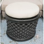 ANDREW MARTIN STOOL, circular, African style stool with carved lattice base and cushion,