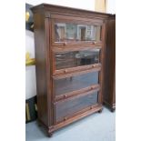 BOOKCASE, Victorian style, hardwood, with four glazed sliding doors raised on rounded feet,