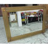 WALL MIRROR, Regency style, rectangular gilt with roundel detail, 110cm x 79cm.