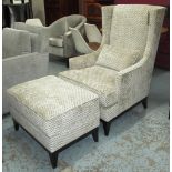 WINGBACK ARMCHAIR, in Osborne and Little fabric on square supports, 76cm W x 112cm H x 61cm D,