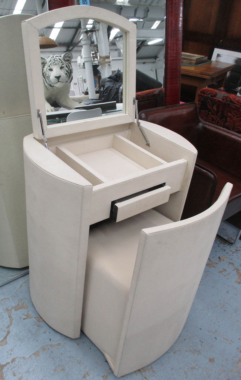 VANITY SET, with lift up mirror and fitted interior, in an ivory coloured leather finish,