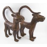 PAIR OF LARGE BRONZE LEOPARDS, Benin manner, patinated finish, each 60cm nose to tail x 74cm H max.