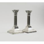 A PAIR OF EDWARDIAN SILVER TABLE CANDLESTICKS, of Classical column form, Sheffield 1901,