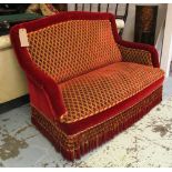 NAPOLEON III SOFA, with patterned red plush upholstery, bullion fringe,