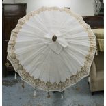 PARASOL, Indian style, in white and gold fabric on a part gilded wooden pole, 260cm H.