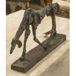 AFTER GIACOMETTI SCULPTURE, 'The dog', bronze on a rectangular platform base, 79cm W.