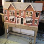 DOLLS HOUSE, painted in the form of two Edwardian terrace houses, with a quantity of furniture,