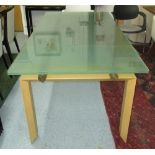 DINING TABLE BY DE SALTO extending with two leaves, opaque glass top on wooden supports,