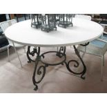 ORANGERY LUNCHEON TABLE, the circular polished stone top on a wrought iron base, 138cm diam.