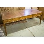 BUREAU PLAT, 20th century French walnut with tooled with brass edging,