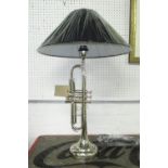TABLE LAMP, in the form of a trumpet in chromed metal with shade, 80cm H.