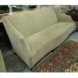 SOFA, of substantial proportions of shaped form, 237cm W x 99cm H x 100cm D.