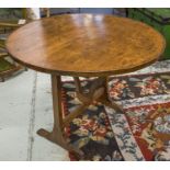 VENDAGE TABLE, 19th century French poplar and oak with circular tilt top, 73cm H x 96cm D.