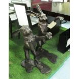 BRONZE FIGHTING HARES, a pair, on bases, 80cm H.