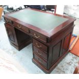 PEDESTAL DESK IN HARDWOOD, with cupboard and six drawers below, 135cm x 75cm x 81cm H.