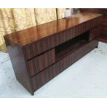 SIDEBOARD, in palisander finish with seven drawers and central shelf,183cm x 46cm x 76cm H.