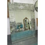 WALL MIRROR, Art Deco style, rectangular with a central bevelled plate, 111cm W x 150cm H.
