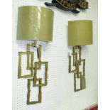 WALL LIGHTS, a pair, by Monpas, with shades in abstract gilt design.