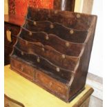 LETTER RACK, of waterfall form with shaped racks and metal studs, 52cm w x 19cm D x 43cm H.