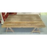 LOW TABLE, with oak plank top on triangular supports to the ends, 155cm x 101cm x 38cm H.