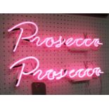 ILLUMINATED NEON SIGN, a pair, for prosecco, 50cm L.