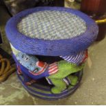 BAMOUN BEADED STOOL, all over clad with colourful beads, the circular seat supported by figures,