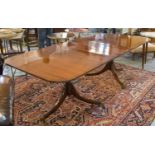 DINING TABLE, Regency design mahogany with turn pillar outswept supports and additional leaf,