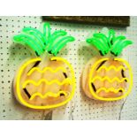 ILLUMINATED NEON SIGN, a pair of pineapples, 29cm H.