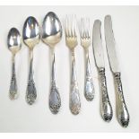 RUSSIAN ERA MELCHIOR CUTLERY SET, twelve place setting, decorated with foliate relief design,