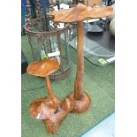 WOODEN MUSHROOMS, a pair, polished natural wood, free standing, 77cm H.