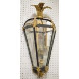 WALL LIGHTS, a pair, Regency style with leaf decorated finials,