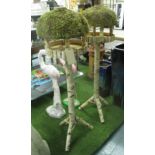 BIRD FEEDERS, a pair, free standing made from silver birch logs, 143cm H.