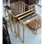 NEST OF TWO TABLES, with mirrored tops on gilded metal frames, largest 45cm x 45cm x 52cm H.