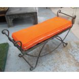 WINDOW SEAT, Paulton Designs style, scrolled wrought metal with orange cushions,