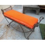 WINDOW SEAT, Paulton Designs style, scrolled wrought metal with orange cushions,