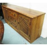 SIDEBOARD, hardwood with two lattice fronted doors flanked by three drawers, 46cm x 82cm H x 170cm.