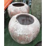 TERRACOTTA POTS, a pair, each 59cm x 62cm H.