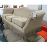 SOFA, brown traditional style, outswept arms with bullion fringe, 83cm D x 89cm H x 252cm W.