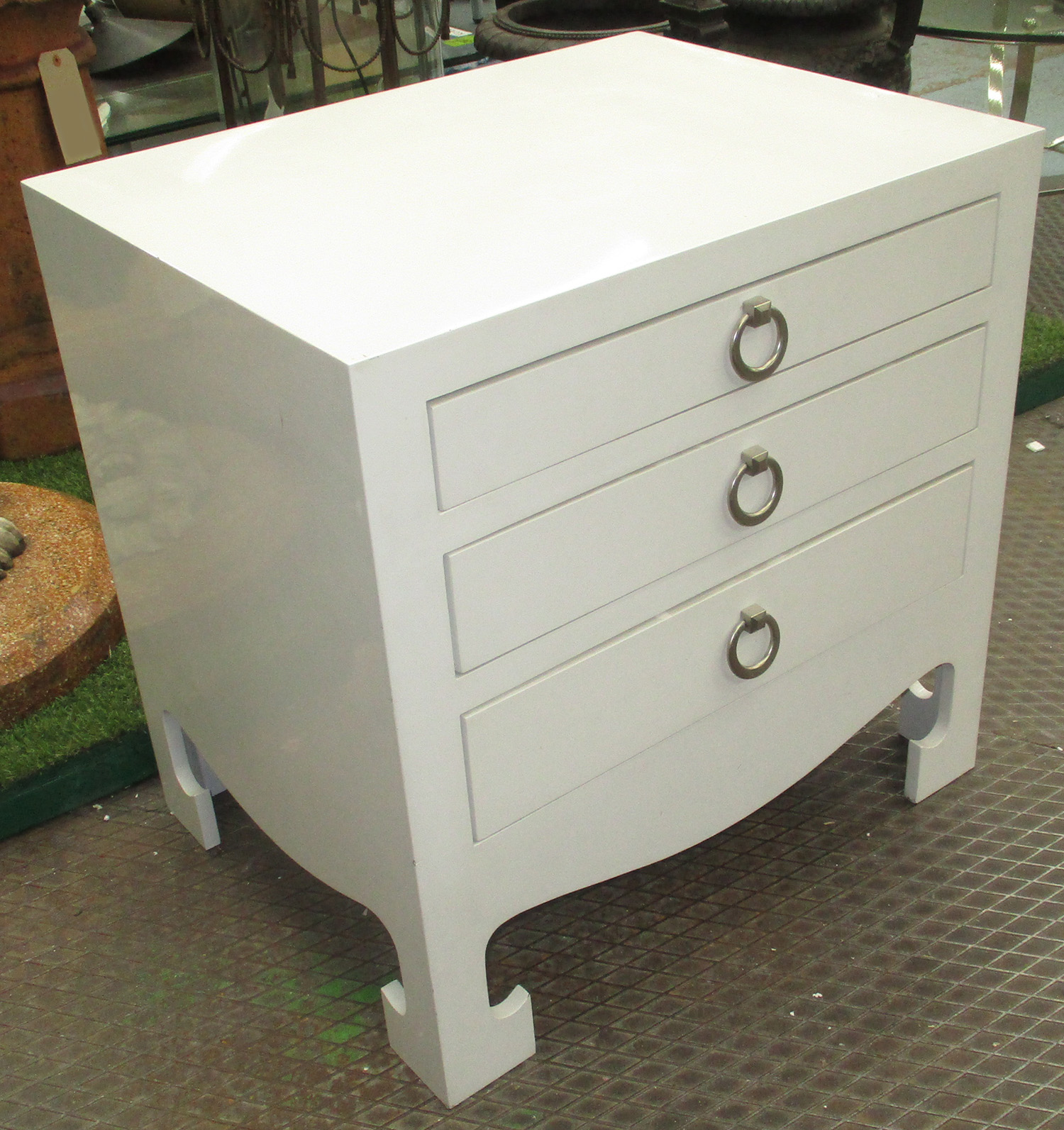CHEST, in white finish of three drawers with ring handles on Chinese style feet,