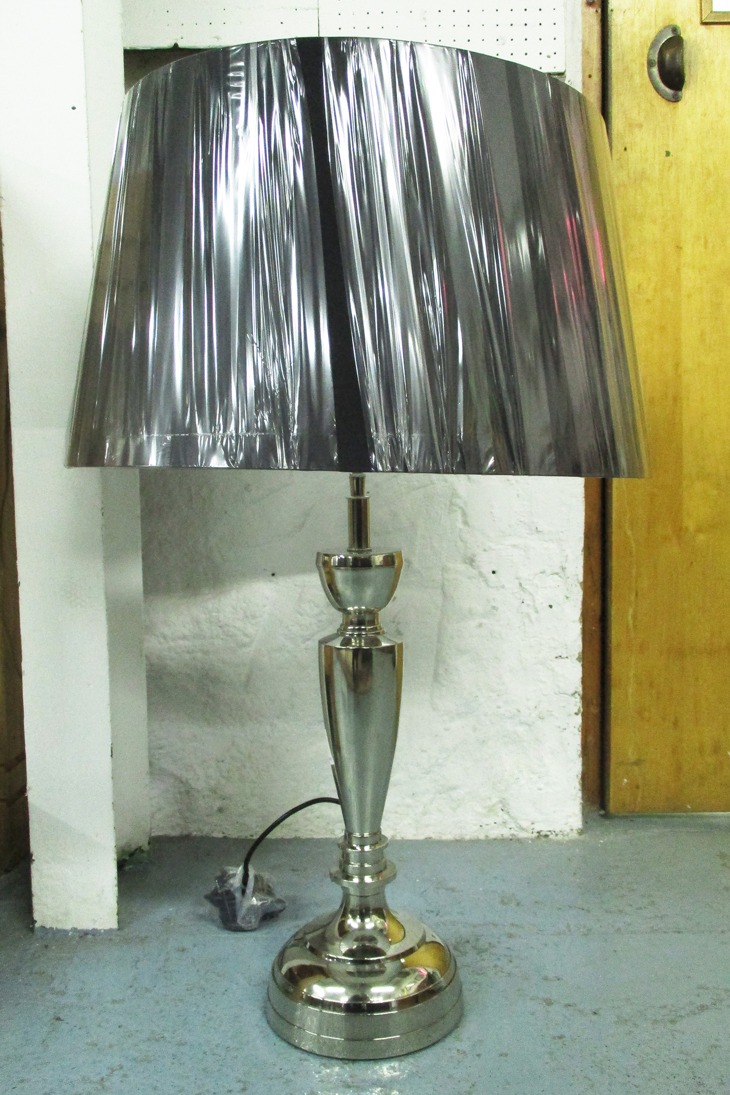 TABLE LAMP, in chromed metal finish with shade, 87cm H.