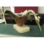 TABLE ORNAMENT, of a bird in wood and brass on marble base, by Italian designer,