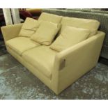 SOFA BY VALENTINI, two seater in cream leather on block supports, 178cm L.