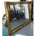 GILT MIRROR, of large proportions, with bevelled plate, 154cm H x 219cm W.