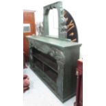 BOOKCASE, of substantial proportions, carved wood in a distressed green painted finish,