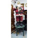 FATHER CHRISTMAS/SANTA CLAUS, fibre glass on green stand, overall approx 240cm H.