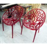 TRANSLUCENT RED CHAIRS, a pair, of organic form, each 59cm W.
