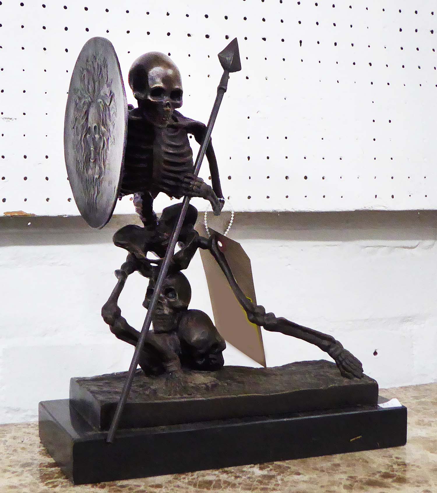 BRONZE STATUE of a skeleton.