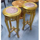 JARDINIERE STANDS, a pair, with inlaid circular tops on carved gilt bases, 79cm H x 40cm W.