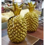 PINEAPPLES, a pair, decorative gold painted.