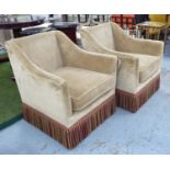 ARMCHAIRS, a pair, in chenille with bullion fringes, each 76cm W x 76cm D x 87cm.